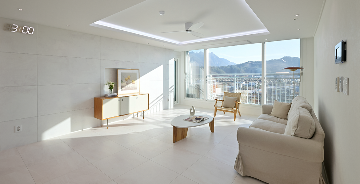 거실 아트월 벽면에 LX Z:IN 벽장재 에디톤 월을 적용해 고급스러운 무드 연출